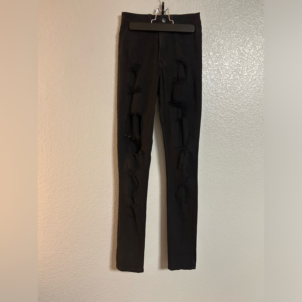 Women’s black ripped stretch high rise skinny pants size 3